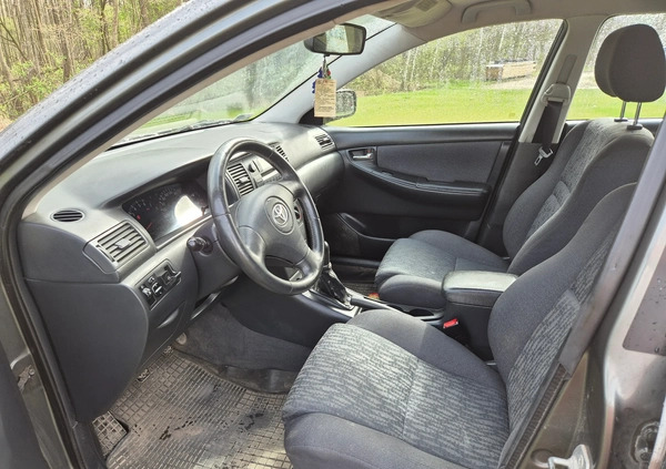 Toyota Corolla cena 7500 przebieg: 311000, rok produkcji 2003 z Strzelce Opolskie małe 121
